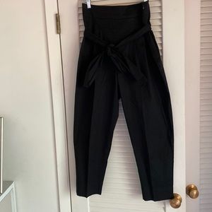 Black paper bag style high waisted pants with tie belt.  Size M